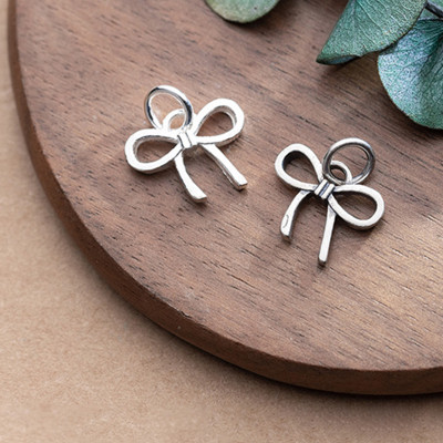 Combo 2 cái charm bạc hình nơ mặt treo - Ngọc Quý Gemstones