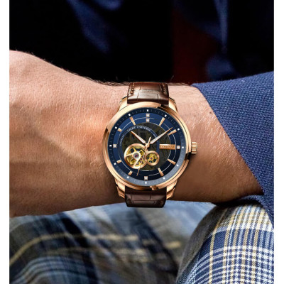 Đồng hồ nam Lobinni L5013-1 Chính hãng ,Kính sapphire nguyên khối ,chống xước,chống nước 50m,mặt xanh vỏ vàng hồng dây da nâu xịn, thép không gỉ 316L,Đồng hồ cơ (Automatic) bảo hành 24 tháng, hàng mới 100%,thiết kế lộ cơ trẻ trung và sang trọng