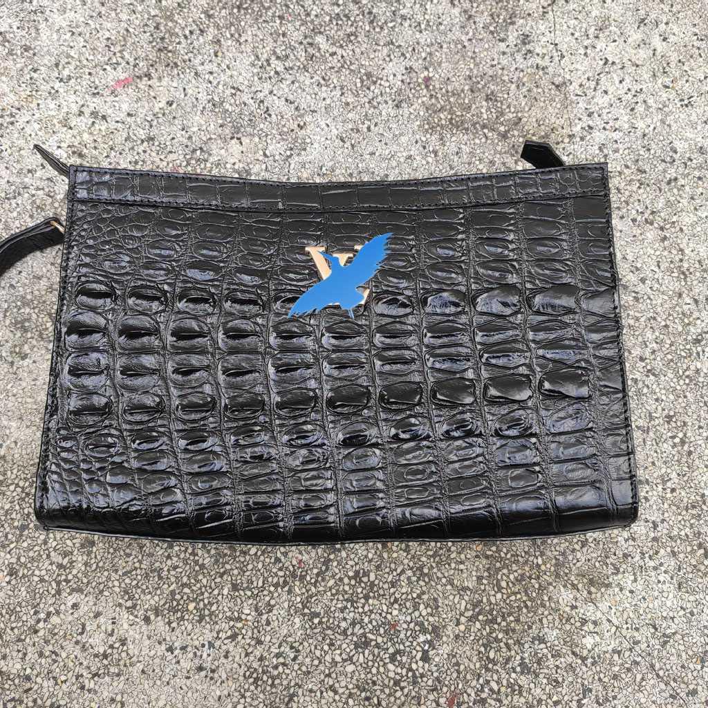 Clutch cầm tay da cá sấu