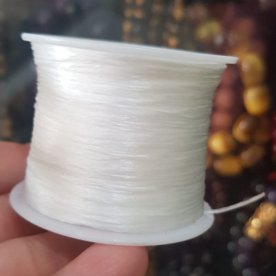 Cuộn Dây Thun CO GIÃN màu Trắng xỏ vòng hạt chuỗi Dây này là dây thun chuyên xỏ vòng chuỗi màu Trắng, có đủ màu Anh Chị đang đeo chuỗi muốn thay dây khác cho vòng thì đặt cuộn Thun chỉ này nhé 