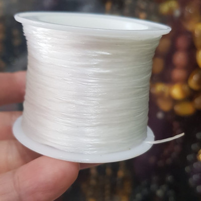 Cuộn Dây Thun CO GIÃN màu Trắng xỏ vòng hạt chuỗi Dây này là dây thun chuyên xỏ vòng chuỗi màu Trắng, có đủ màu Anh Chị đang đeo chuỗi muốn thay dây khác cho vòng thì đặt cuộn Thun chỉ này nhé 