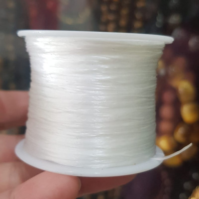 Cuộn Dây Thun CO GIÃN màu Trắng xỏ vòng hạt chuỗi Dây này là dây thun chuyên xỏ vòng chuỗi màu Trắng, có đủ màu Anh Chị đang đeo chuỗi muốn thay dây khác cho vòng thì đặt cuộn Thun chỉ này nhé 