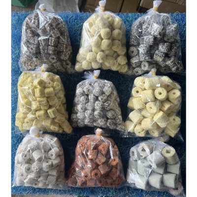 Combo 100g Combo 4 Loại Vật Liệu Lọc Hồ Cá: Than Hoạt Tính +Sứ Trắng 
+- San Hô+ Nham Thạch =100G