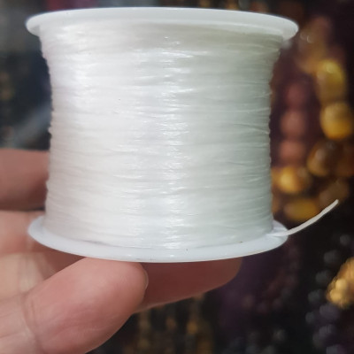 Cuộn Dây Thun CO GIÃN màu Trắng xỏ vòng hạt chuỗi Dây này là dây thun chuyên xỏ vòng chuỗi màu Trắng, có đủ màu Anh Chị đang đeo chuỗi muốn thay dây khác cho vòng thì đặt cuộn Thun chỉ này nhé 