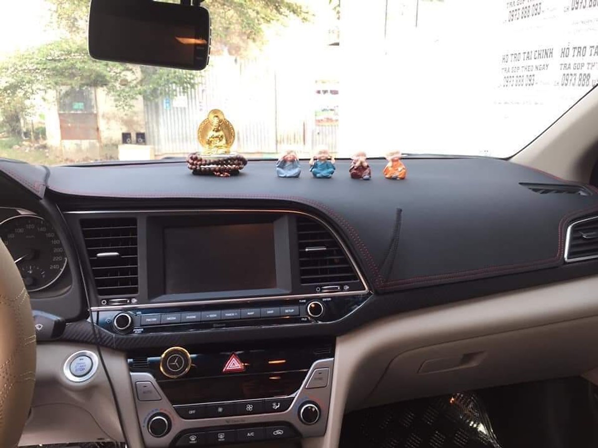 Thảm da Taplo vân carbon Cao cấp dành cho xe Toyota Hilux Revo