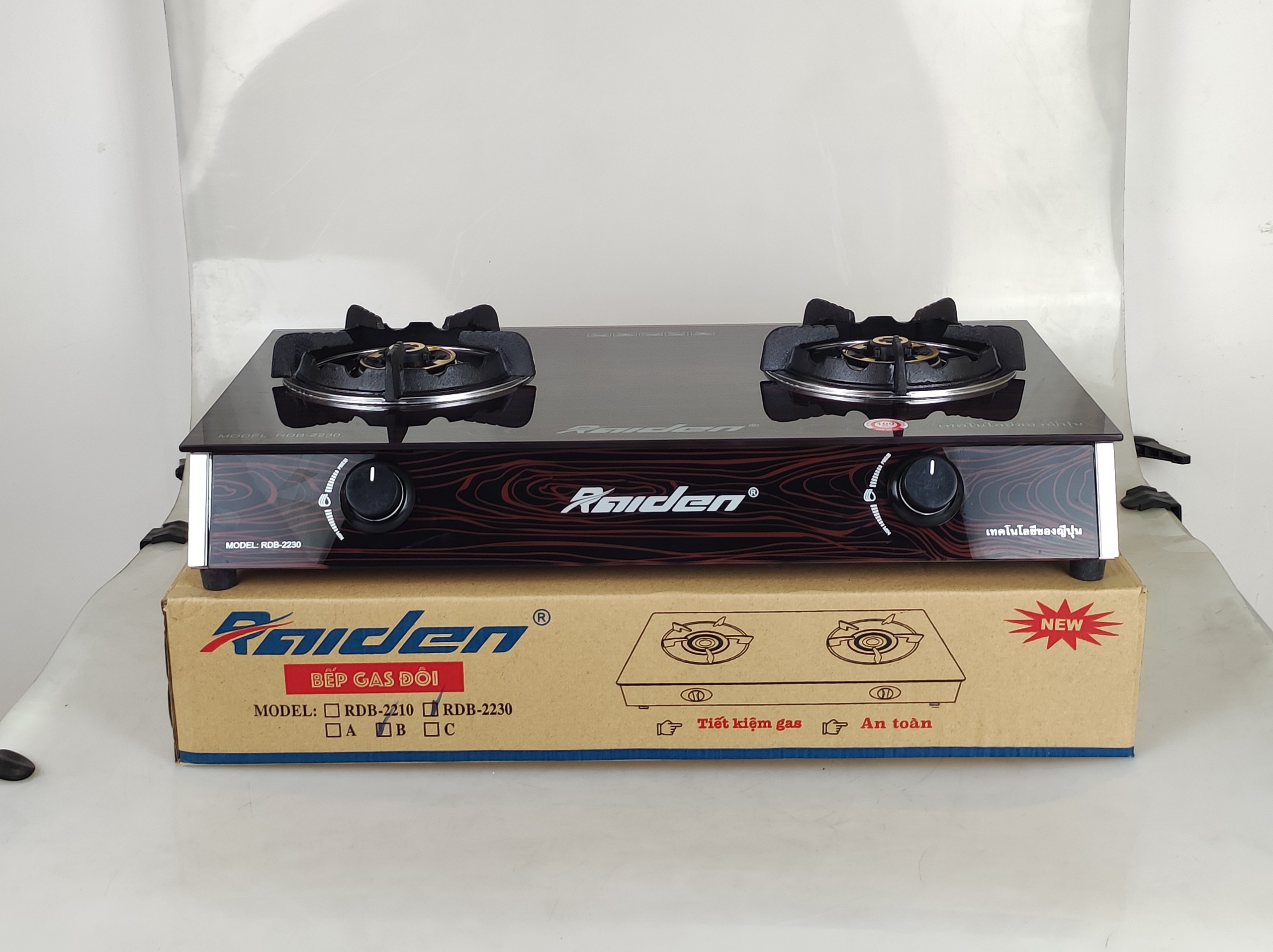 Bếp ga đôi kiếng cường lực Raiden RDB2230A, đầu đốt đồng mũ K38, kiềng men 5 ly-Hàng chính hãng