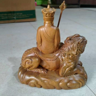 Tượng phật địa tạng vương bồ tát cưỡi kỳ lân bằng gỗ bách xanh thơm nức kt 15×15×9cm