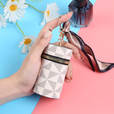 Móc khóa da - túi  đựng  đa năng ,son môi mini , tai nghe nhỏ gọn và tiện lợi