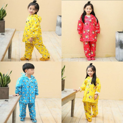 Bộ áo mưa cho  bé trai  và  bé gái từ  9 -  10 tuổi - Áo mưa vải dù nhẹ  , gọn chống thấm  , kèm túi đựng xinh xắn ,giao màu ngẫu nhiên