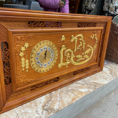 Tranh đồng hồ treo tường khắc chữ tài lộc bằng gỗ gõ đỏ kt 67×127×4cm