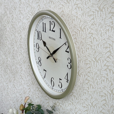 Đồng hồ treo tường Rhythm CMG610NR18 Kt 36.1 x 5.1cm, 0.84kg. Vỏ nhựa. Dùng Pin.