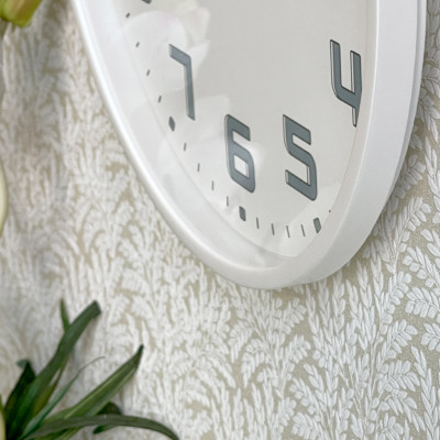 Đồng hồ treo tường Nhật Bản Rhythm CMG599NR03- Kt 30.6 x4.0cm, 630g Vỏ nhựa. Dùng Pin.