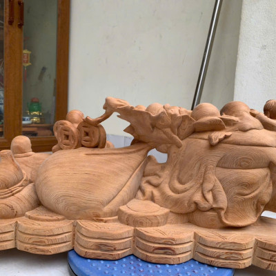 Tượng phật di lặc kéo bao vàng  bằng  gỗ ngọc Am thơm nức kt 50×22×12cm 