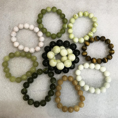 Vòng tay chuỗi hạt ngọc canxidene màu hồng phấn 16 li đá tự nhiên của Việt Nam vongtaychuoihat16li