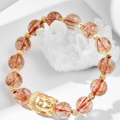 Vòng tay thạch anh tóc đỏ charm phật bạc Ngọc Quý Gemstones